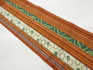 本場筑前博多縞に雪輪・雪芝模様織り出し名古屋帯